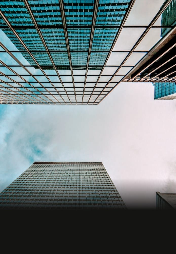 Looking Up Blue Modern Office Building Bottom view of business buildings skyscrapers in New York City Skyline